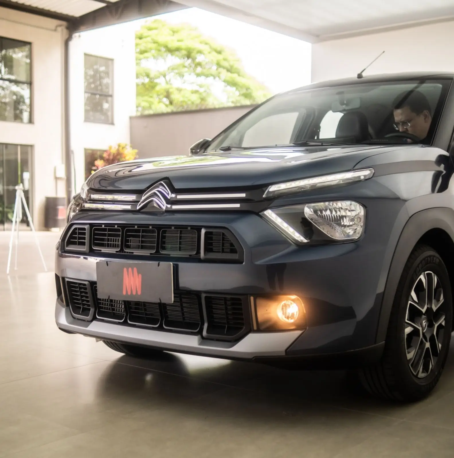 a man sitting in a car